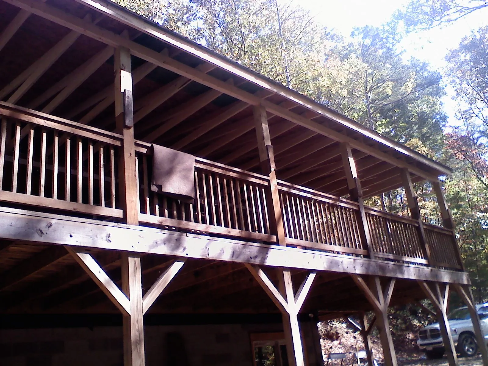 Timber framing under a new elevated porch and deck — Roof Leak Repair in Maple Mount by Roofing Brothers